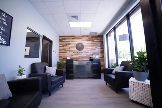Modern waiting area with comfortable seating at All In Solutions Counseling Center, detox center in Miami.
